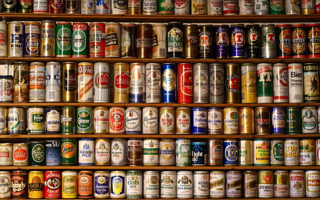 Vintage Beer Cans on Open Shelves